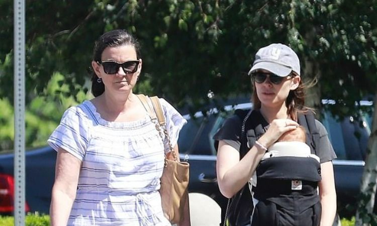Kathleen McNulty Rooney with her daughter, Kate Mara, and grandchild. 